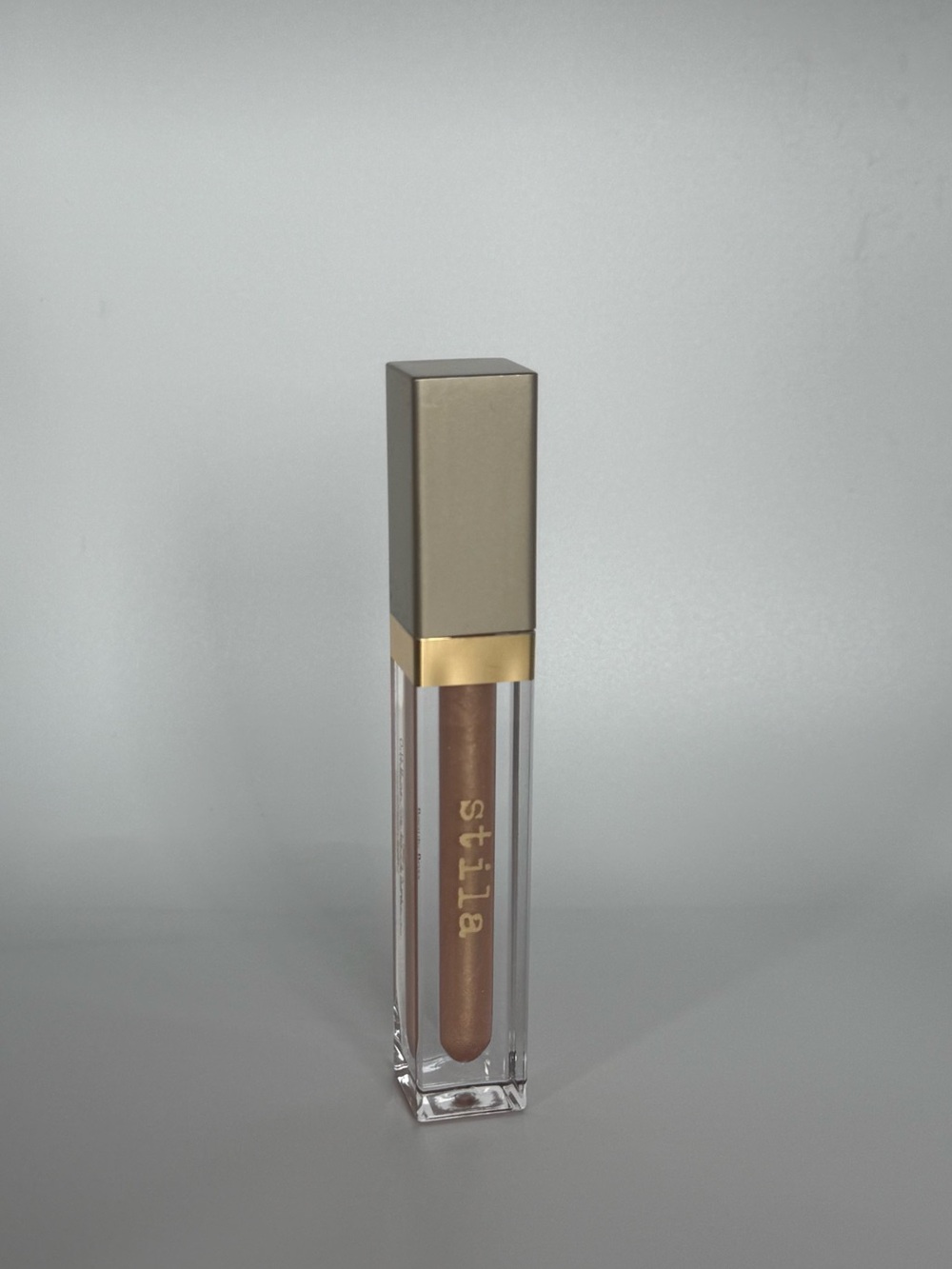 Stila lip gloss— golden parachute